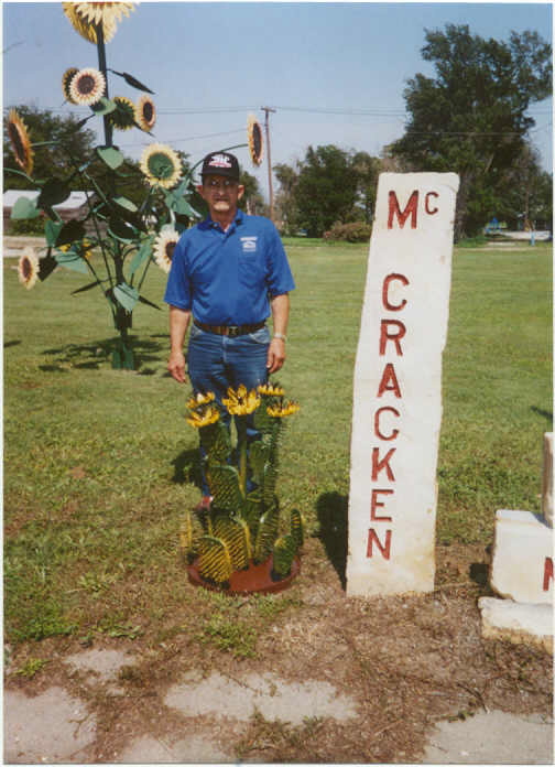 Sculpture of prickley pear cactus made by Pat Istas of Lecompton.  Stone marker and sunflower also made by Pat for the Jail/Museum yard