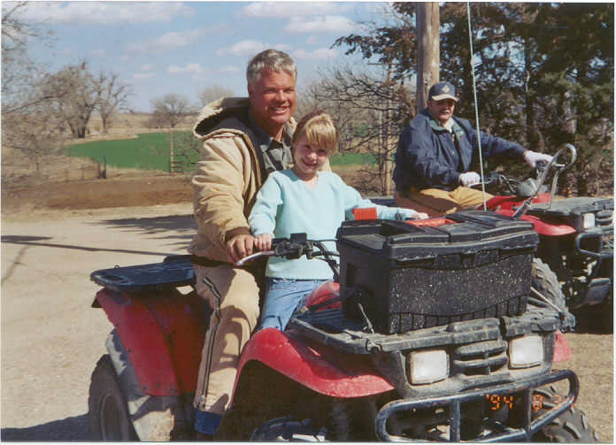 This is John Irvin and Dennis Walker plus a cow chaser in training.